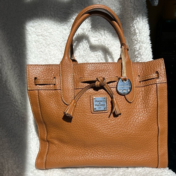 Dooney & Bourke Handbags - Dooney and Bourke brown leather tassel tote 👜